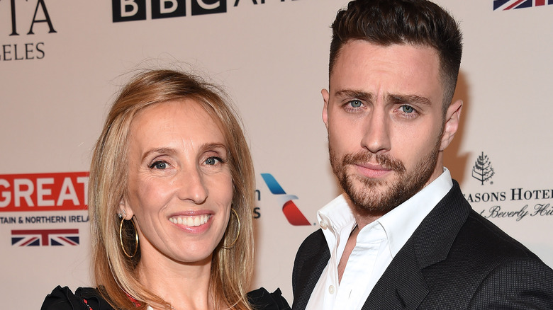 Aaron Taylor-Johnson and Sam Taylor-Johnson posing at an event