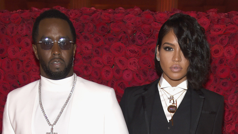 Cassie and Sean Love Combs posing at an event