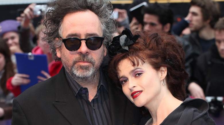 Helena Bonham Carter and Tim Burton posing at an event