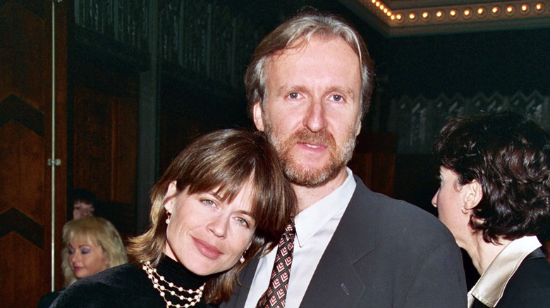 Linda Hamilton leaning her head on James Cameron's shoulder