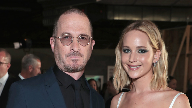 Darren Aronofsky and Jennifer Lawrence posing at an event