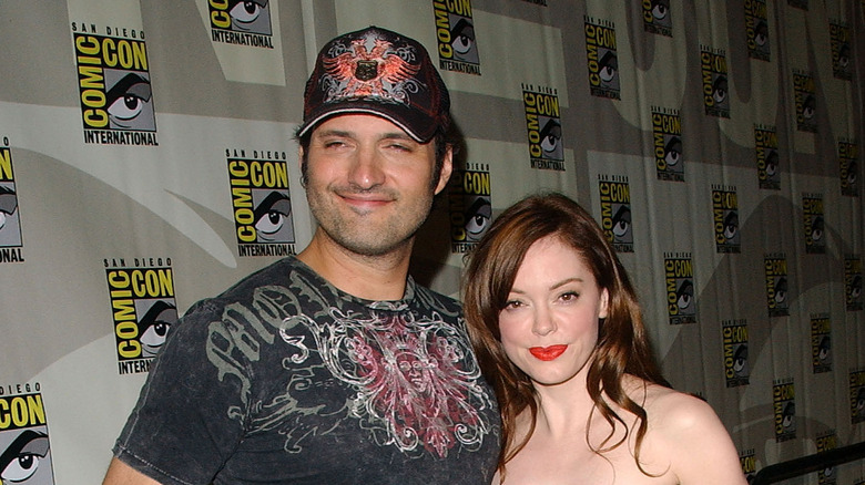 Rose McGowan and Robert Rodriguez posing at Comic Con