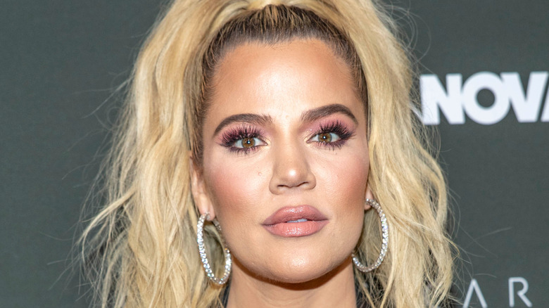 Khloe Kardashian wears hoops