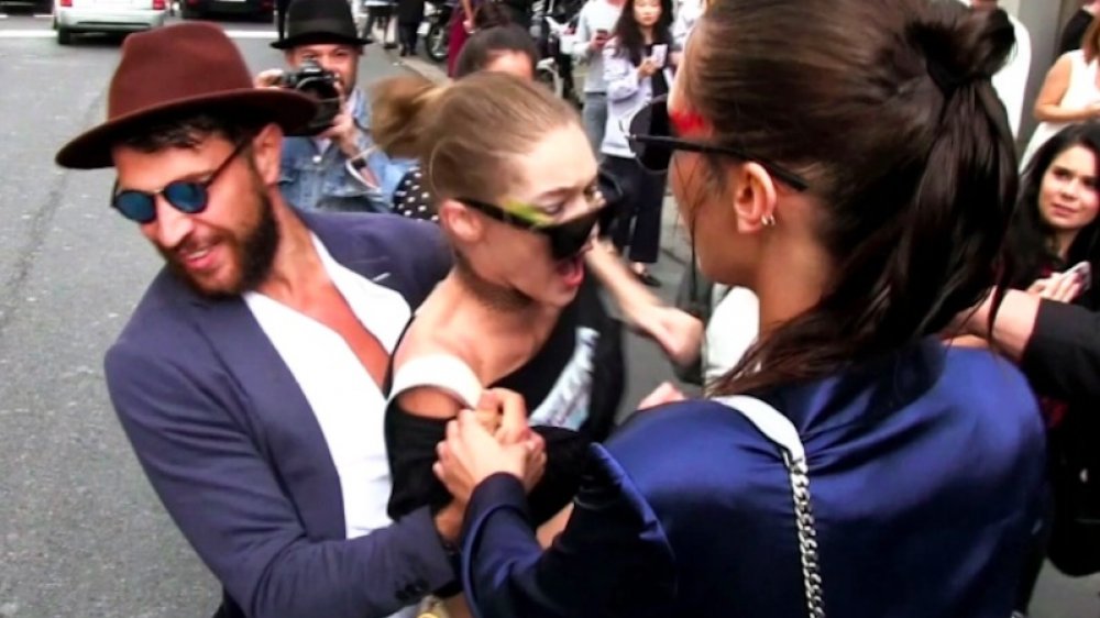 Vitalli Sediuk, Gigi Hadid, and Bella Hadid outside the Max Mara fashion show in Milan 