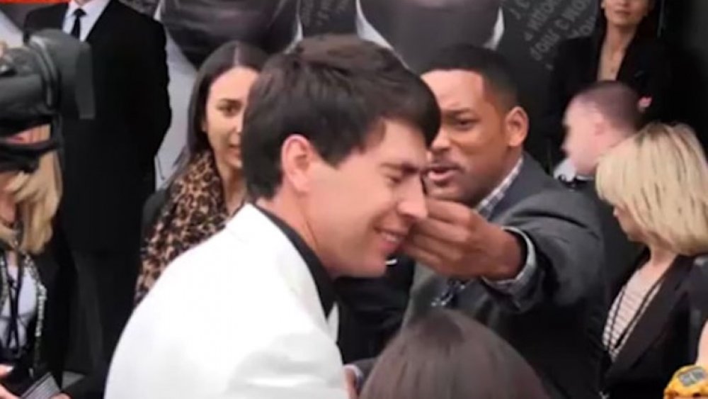 Vitalii Sediuk being slapped on the face by Will Smith on the red carpet for Men in Black 3