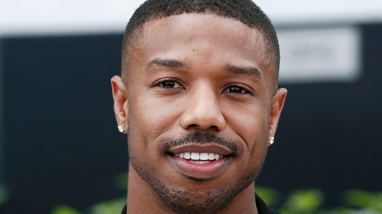 Michael B. Jordan posing for cameras