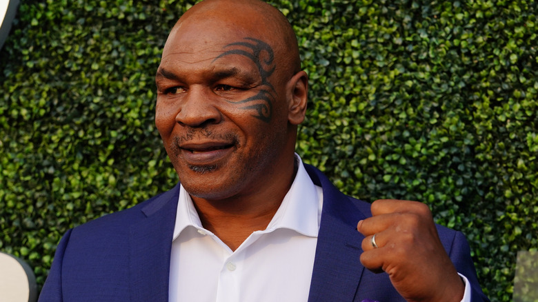 Mike Tyson posing for cameras