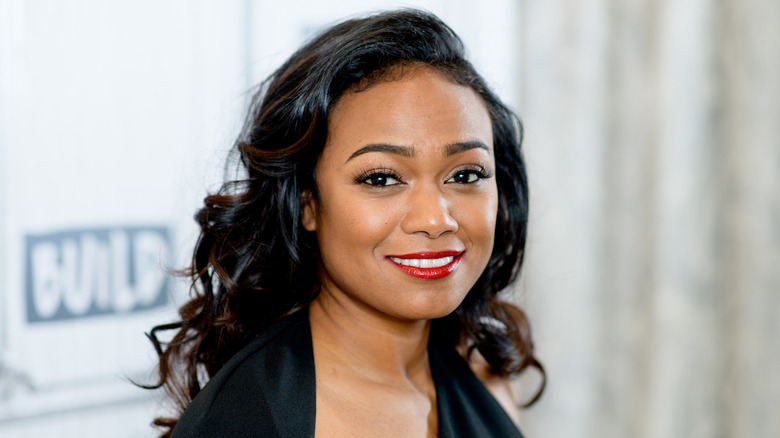 Tatyana Ali smiling