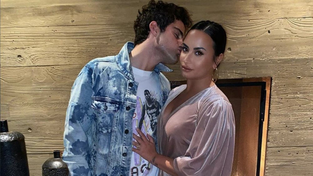 Max Ehrich kissing Demi Lovato