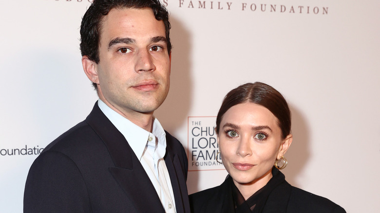 Louis Eisner and Ashley Olsen on the red carpet