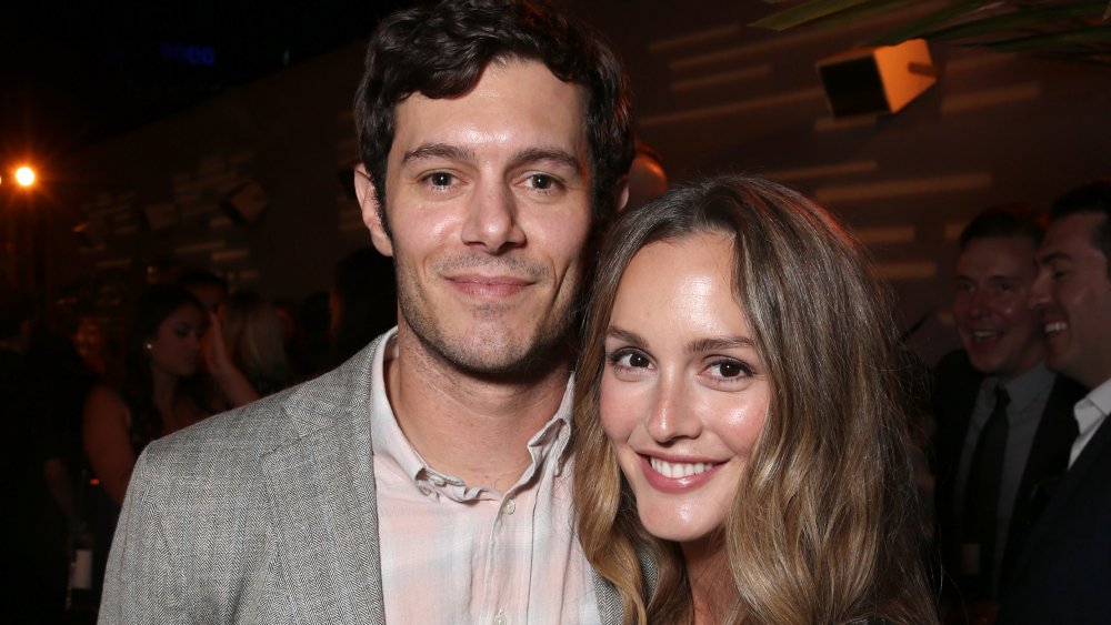 Leighton Meester and Adam Brody grinning