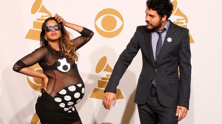 Pregnant M.I.A. posing with Benjamin Bronfman