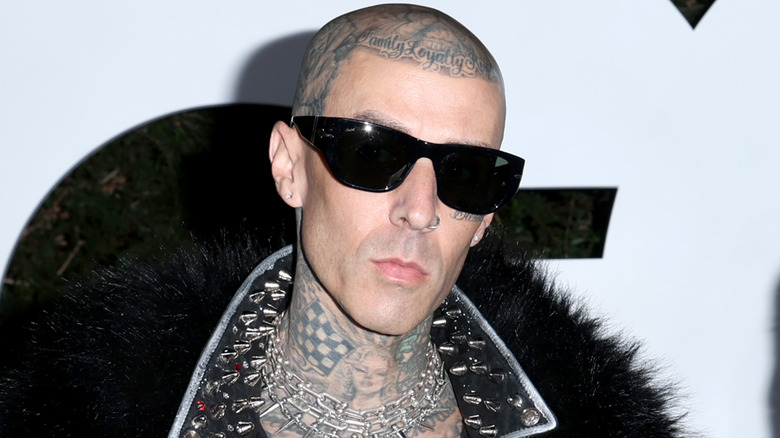 Travis Barker wearing sunglasses