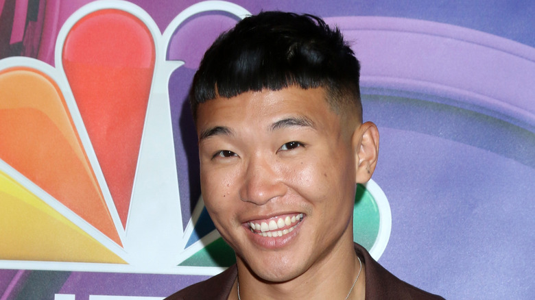 Joel Kim Booster smiling