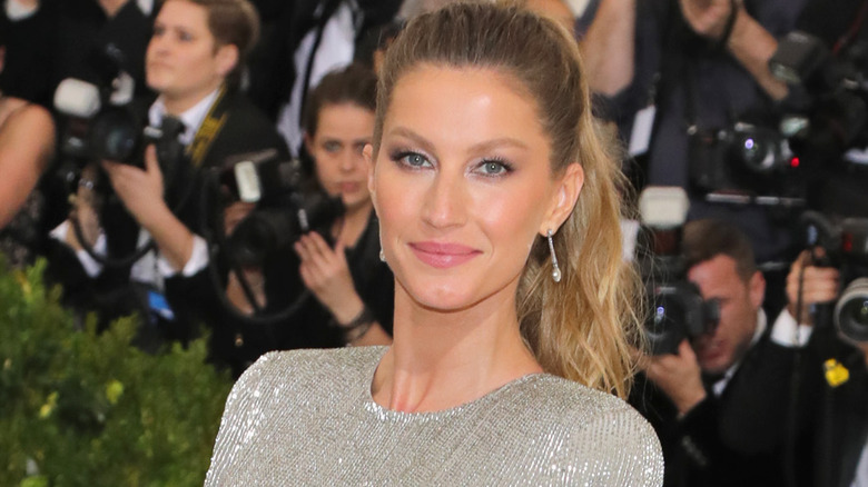 Gisele Bundchen smiling at event