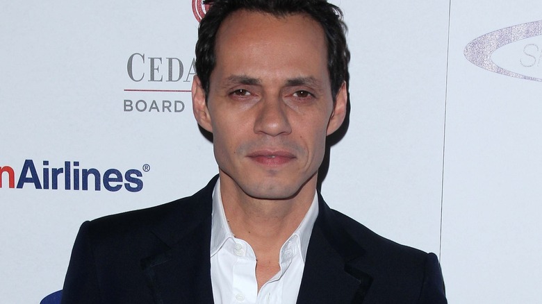 Marc Anthony looking serious at event