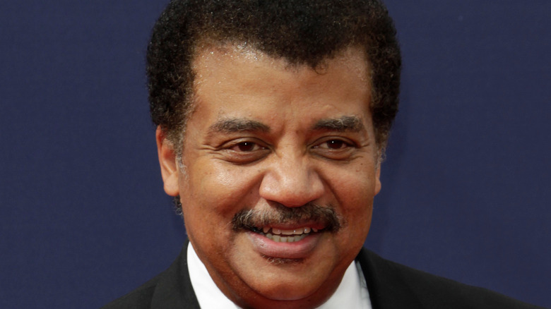 Neil DeGrasse Tyson posing for cameras