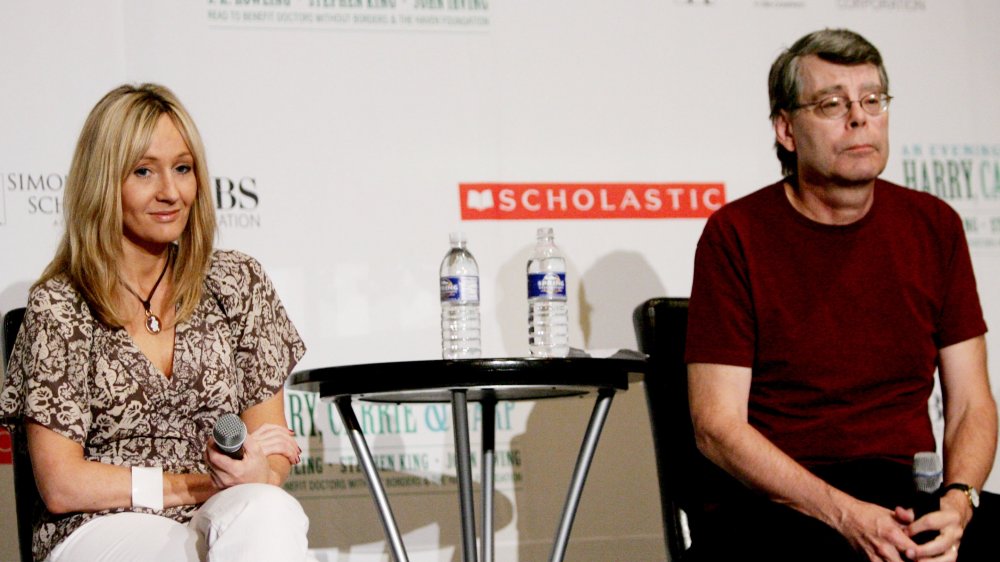 JK Rowling and Stephen King seated at a panel