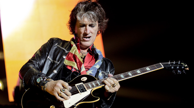 Joe Perry playing guitar