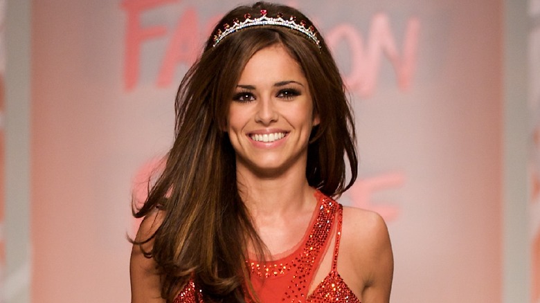 Cheryl Cole walking the runway wearing tiara