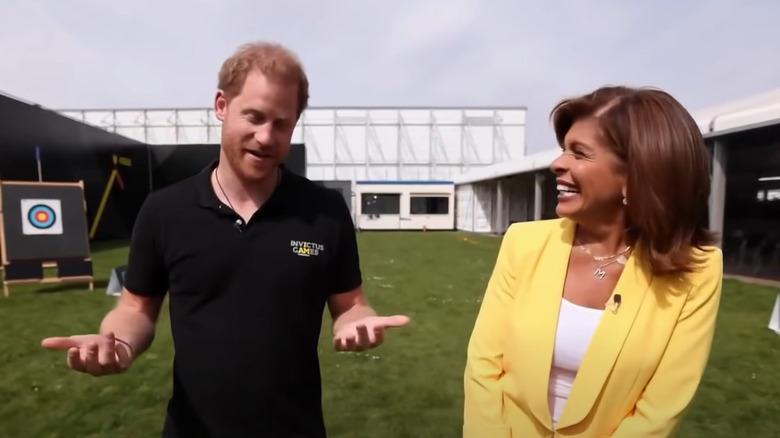 Prince Harry speaking and Hoda Kotb laughing