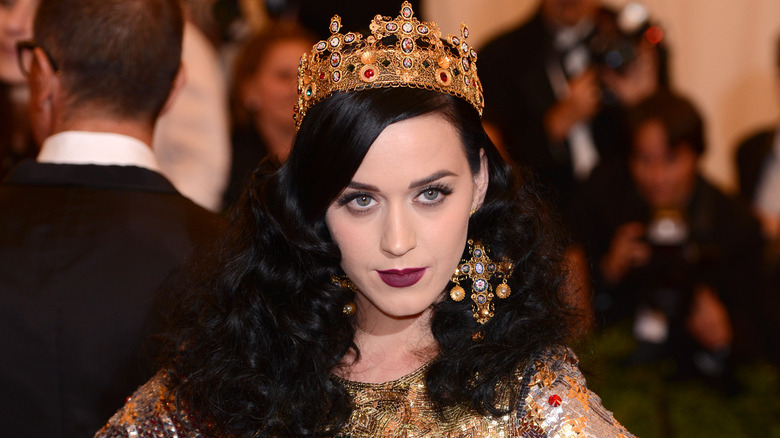 Katy Perry posing wearing a crown