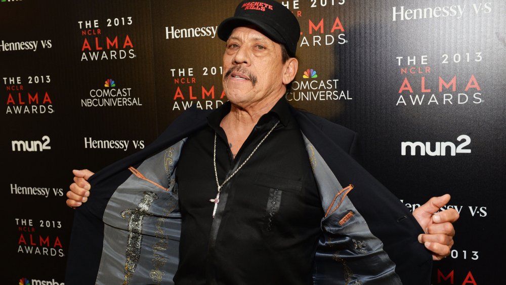 Danny Trejo showing off his designer jacket lining featuring knives at The 2013 NCLR ALMA Awards 