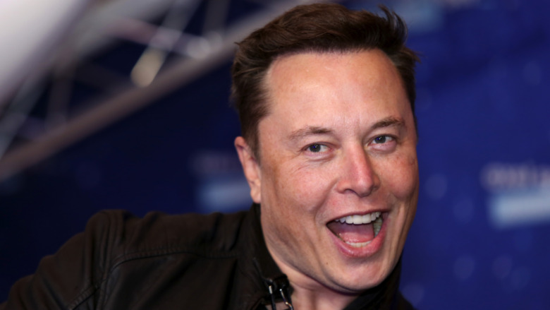 Elon Musk with a mouth-open expression