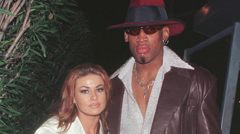 Carmen Electra and Dennis Rodman posing together