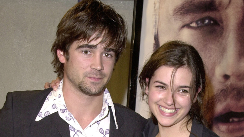 Colin Farrell and Amelia Warner posing together