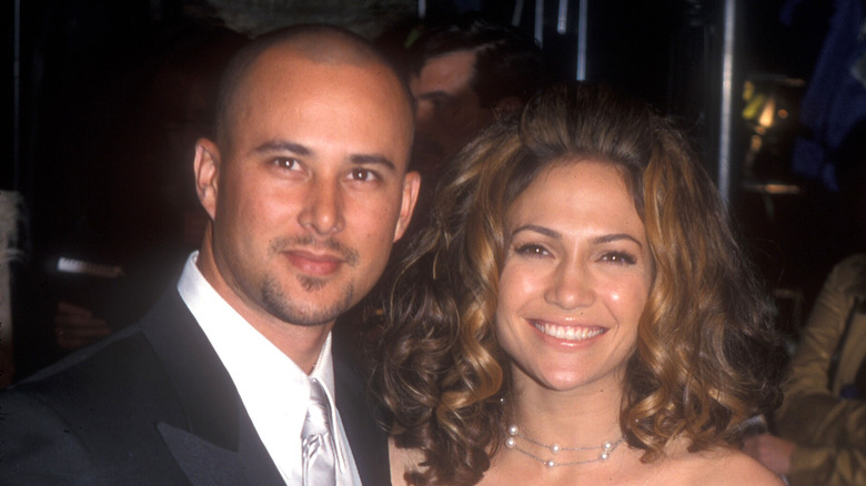 Jennifer Lopez and Cris Judd posing together