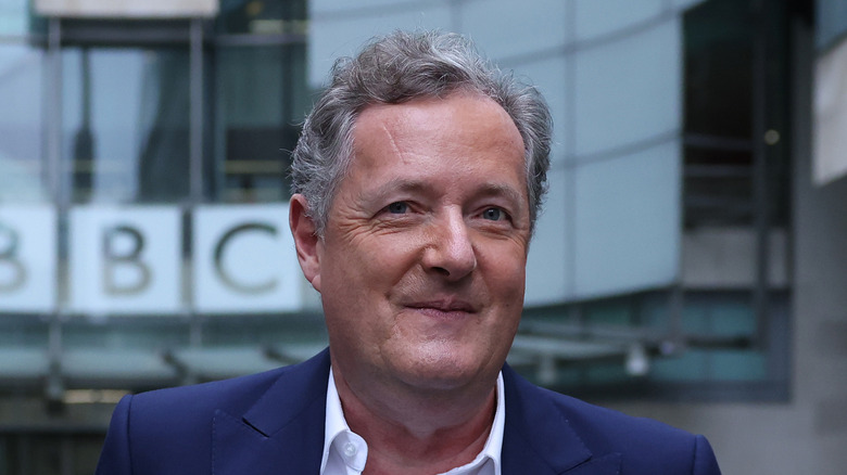Piers Morgan in front of BBC building