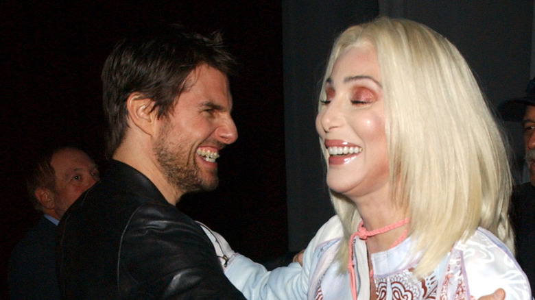 Cher and Tom Cruise laughing