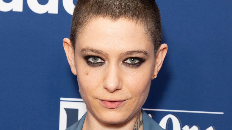 Asia Kate Dillon posing at an event