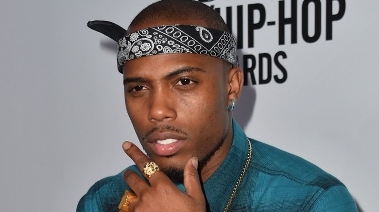 B.o.B posing with hand on chin