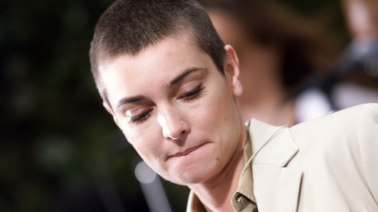 Sinead O'Connor looking down