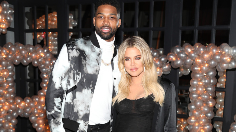 Khloé Kardashian and Tristan Thompson pose together