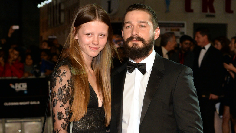 Shia LaBeouf and Mia Goth on a red carpet