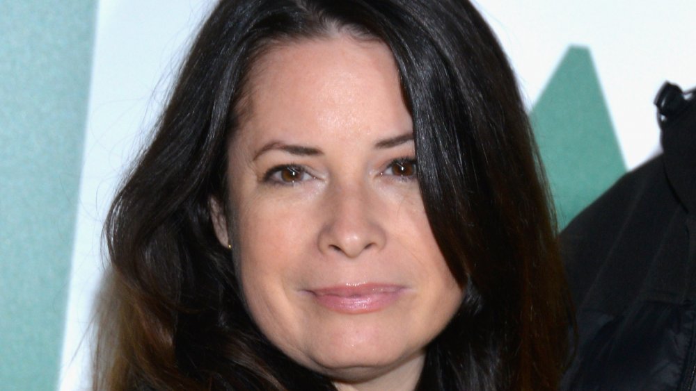 Holly Marie Combs posing with a neutral expression