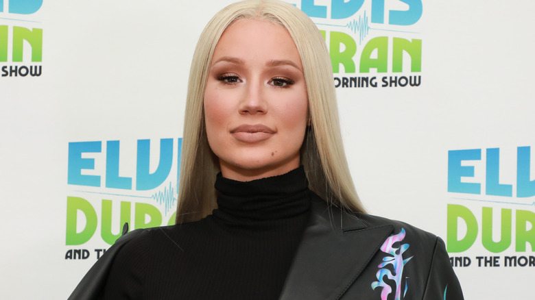 Iggy Azalea posing in turtleneck