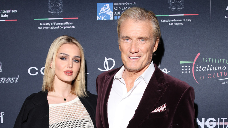 Emma Krokdal and Dolph Lundgren posing together