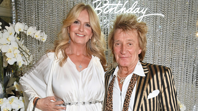 Penny Lancaster and Rod Stewart posing together