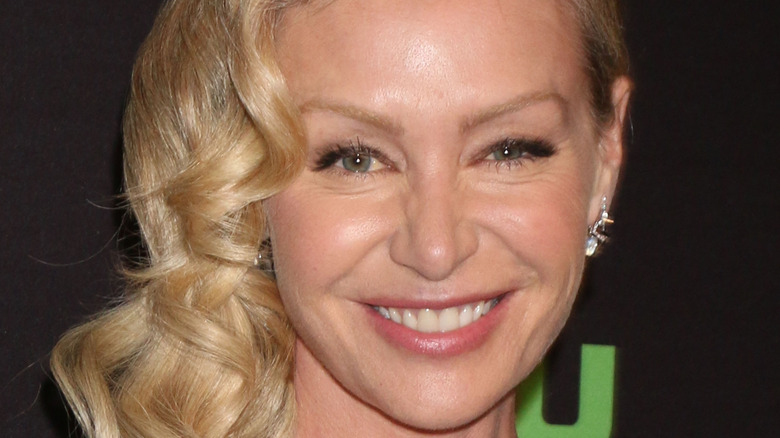 Portia de Rossi grinning 