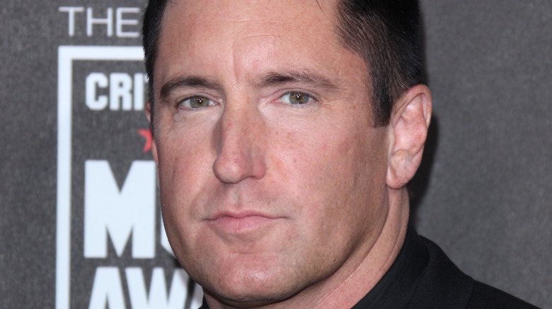 Trent Reznor posing on a red carpet