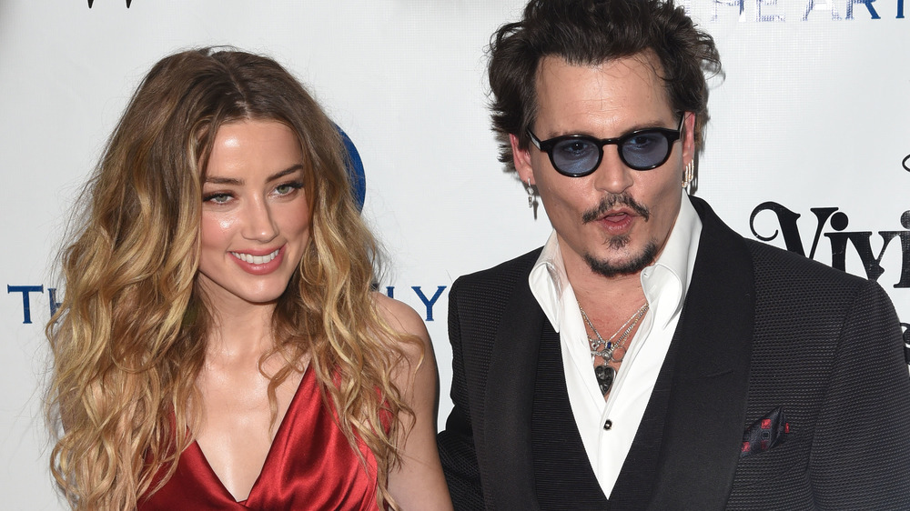 Amber Heard and Johnny Depp smiling