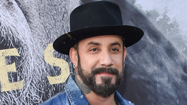 AJ McLean wearing a hat