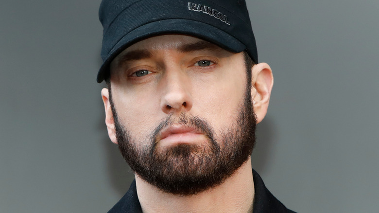 Eminem wearing a hat