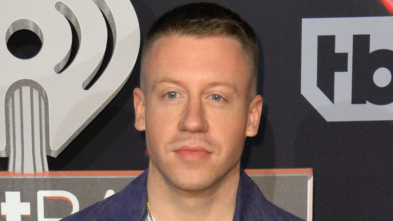 Macklemore posing for cameras