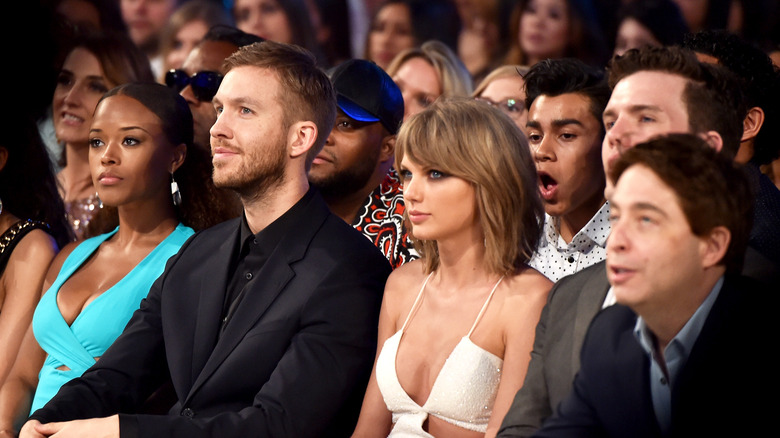 Calvin Harris and Taylor Swift seated together