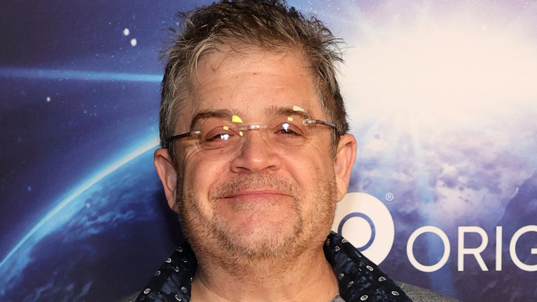 Patton Oswalt smiling at an event